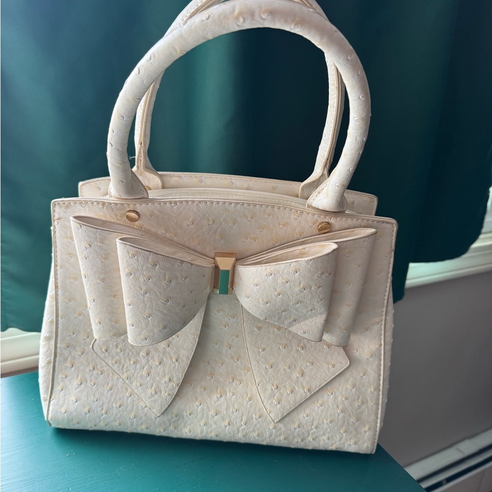 Gross Elegant Cream Bow Handbag
